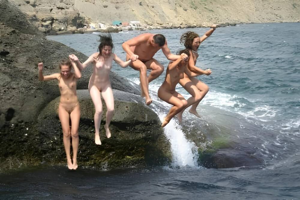 Mens and girls nudists on a beach Nudism naturism club