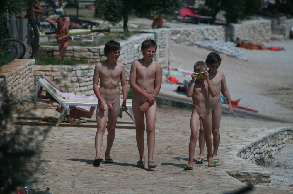 Shore walking nude Nudism naturism club